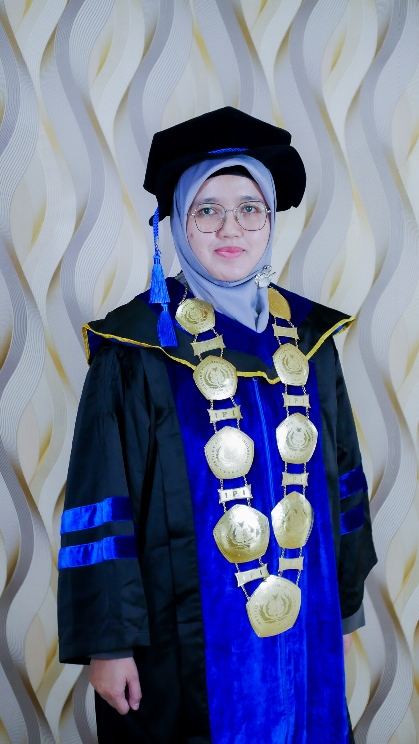 Dr. Tina Sri Sumartini, M.Pd.